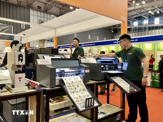 The latest innovations, technologies, and solutions in the printing and packaging industry are on display at the 23rd Vietnam International Printing & Packaging Industry Exhibition in Ho Chi Minh City. (Photo: VNA)