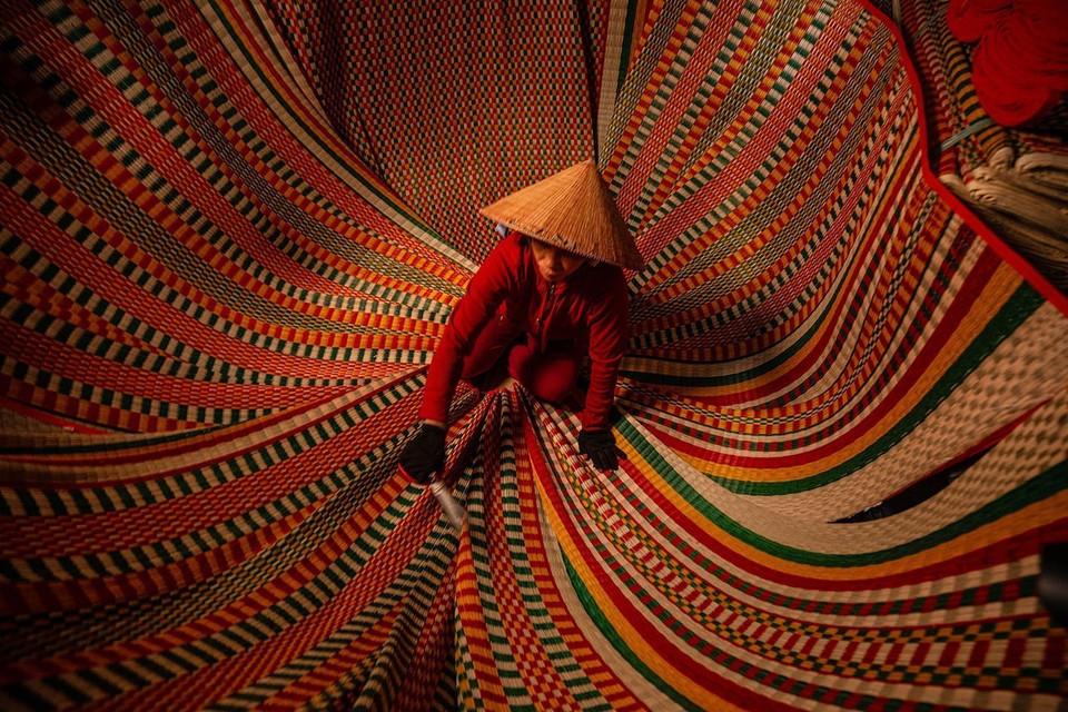 The mat is closely tied to the daily lives and activities of local people through generations. (Photo: VNA)