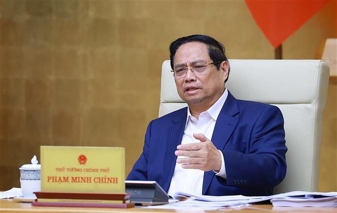 PM Pham Minh Chinh speaks at the Government meeting on December 6. (Photo: VNA)