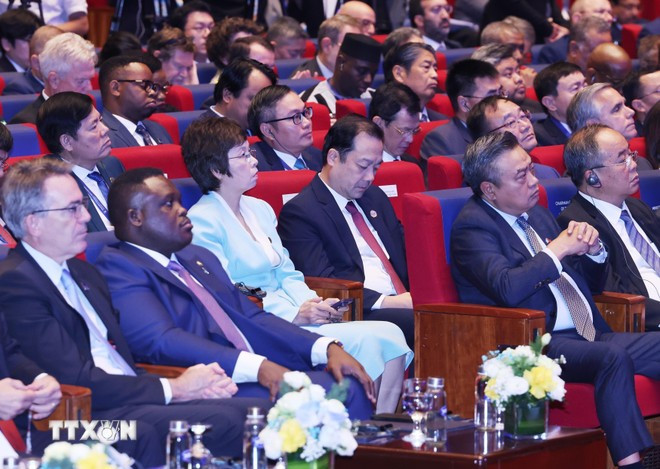 Delegates attend the opening ceremony and high-level conference of the United Nations Convention against Cybercrime. (Photo: VNA)